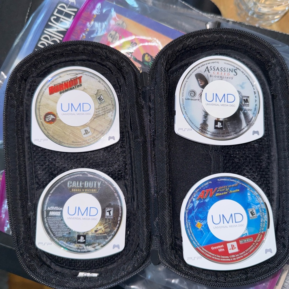 Psp Game Lot Of 4 With Holding Case